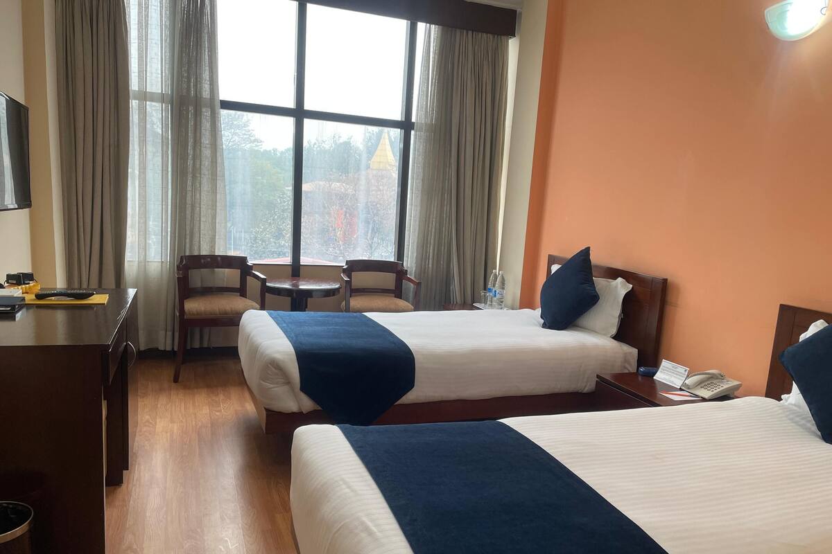 Standard Twin Room, 1 Bedroom - City View | Bathroom | Shower, free toiletries, hair dryer, slippers