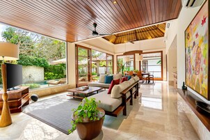 4 Bedroom Pool Villa (Umarya) | Living area | 32-inch flat-screen TV with cable channels, Smart TV, DVD player