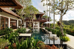 Outdoor pool, pool umbrellas, sun loungers