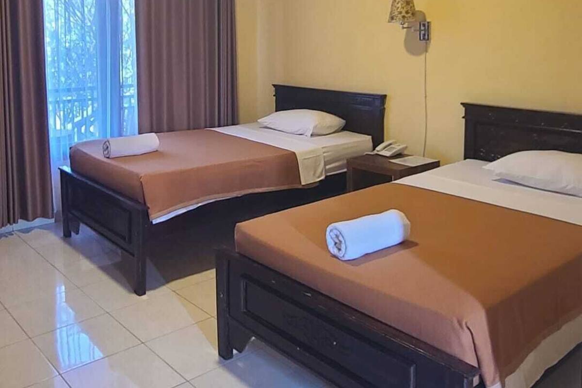 Standard Twin Room, 2 Twin Beds, Pool View | Minibar, in-room safe, individually decorated, desk