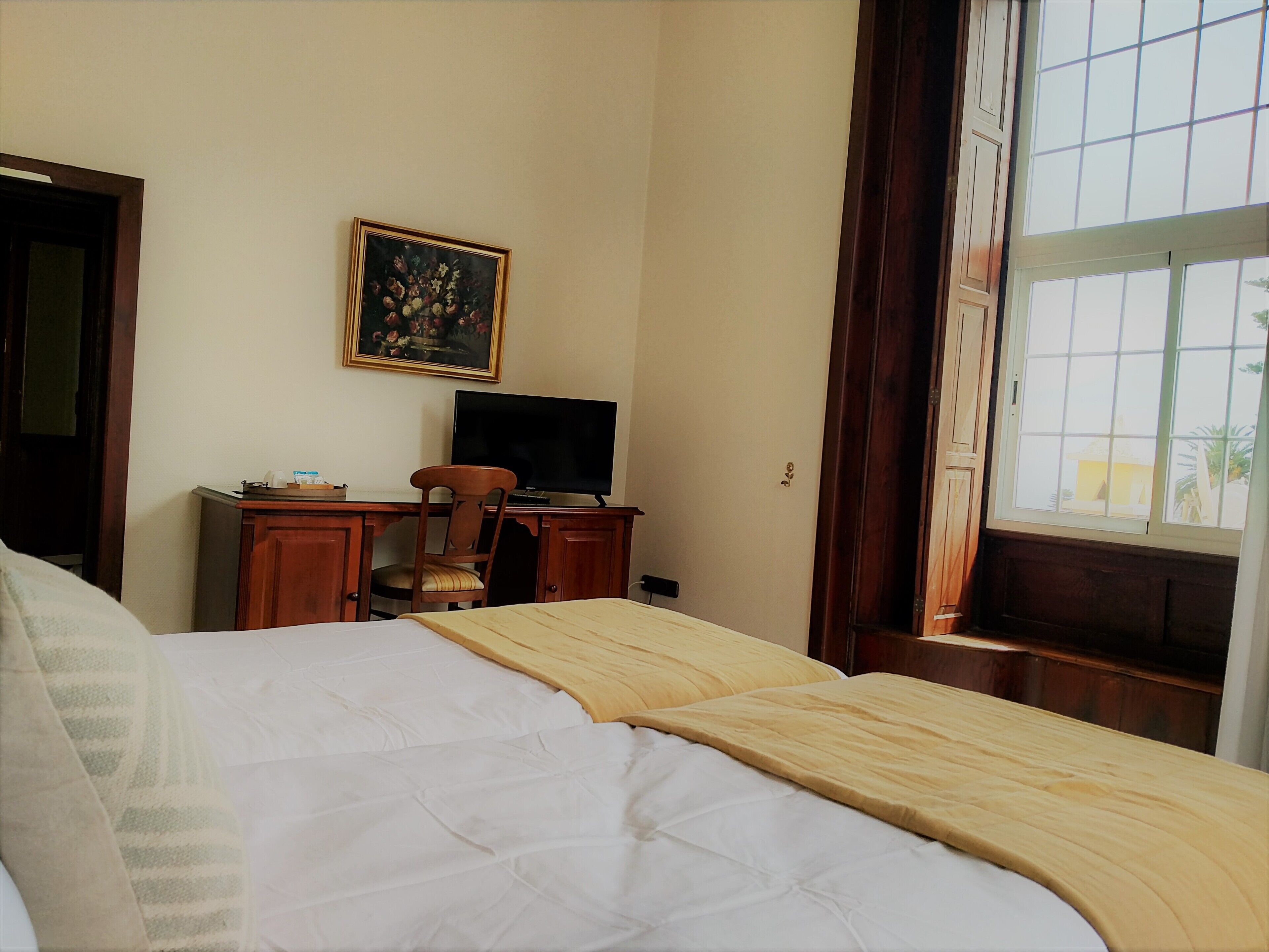 superior double room | minibar, individually decorated, desk, blackout curtains