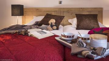 Blackout drapes, soundproofing, free cribs/infant beds, free WiFi