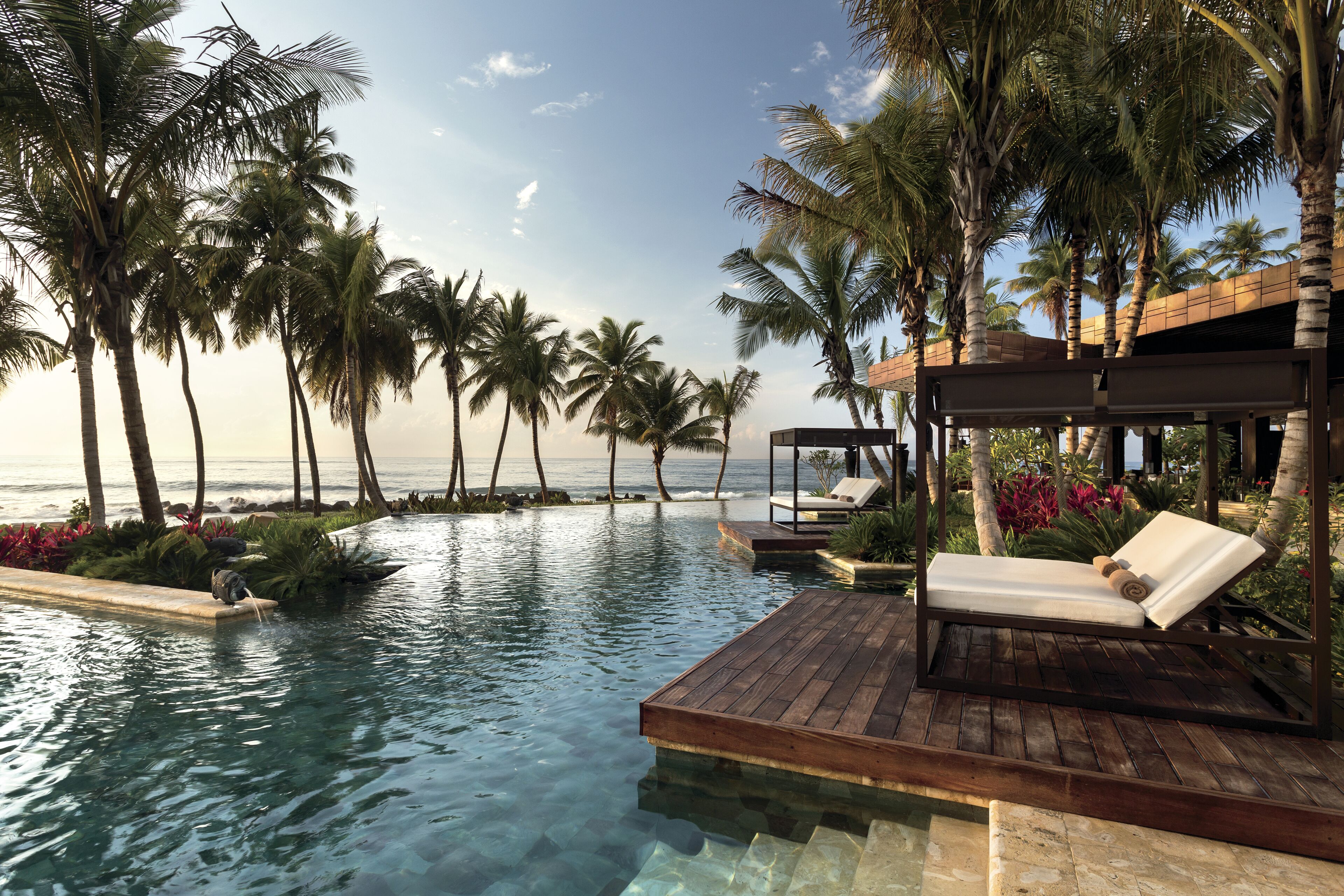 2 outdoor pools, a waterfall pool