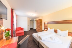 Hypo-allergenic bedding, in-room safe, desk, laptop workspace