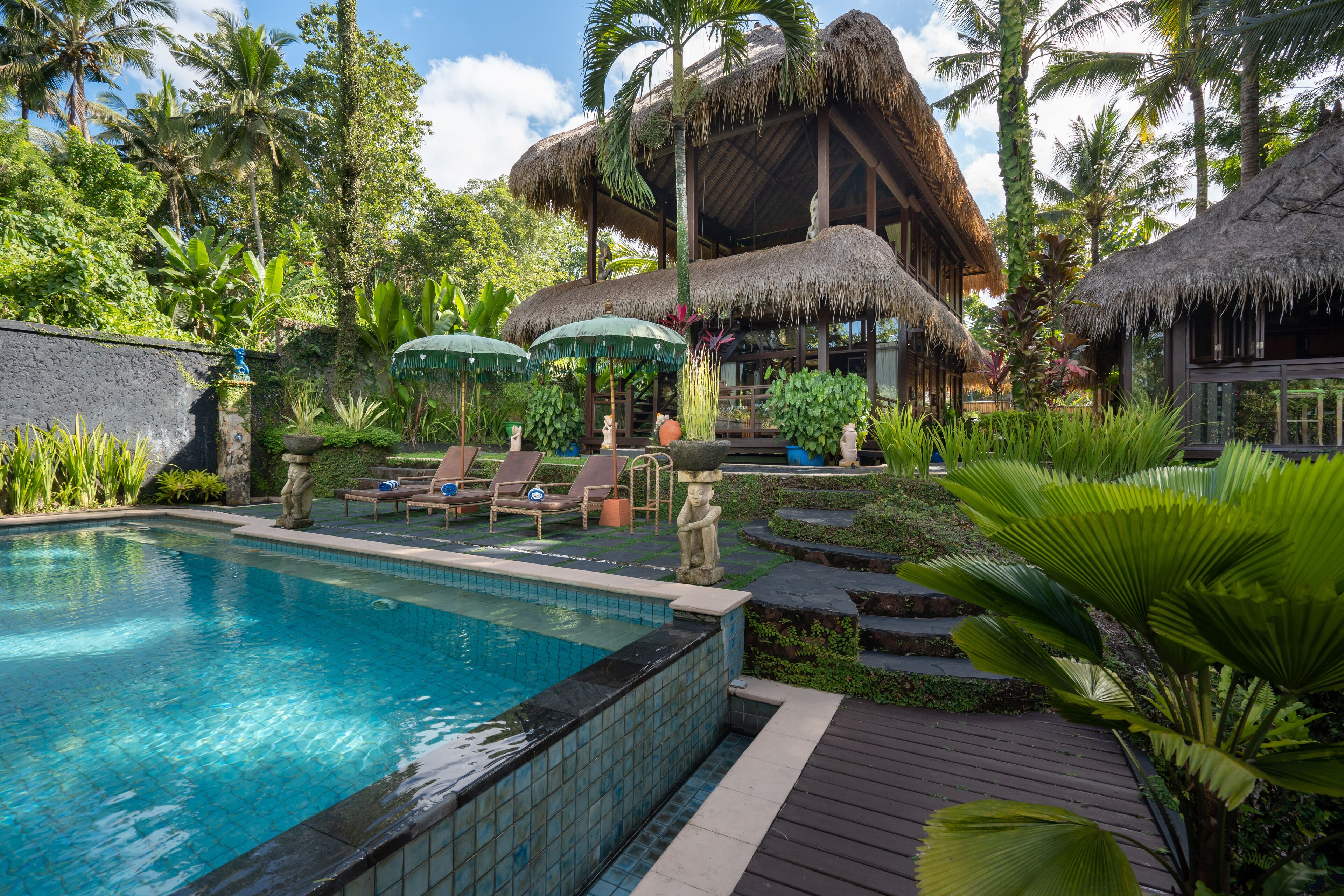 Outdoor pool, pool umbrellas, sun loungers