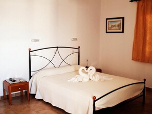 In-room safe, desk, blackout curtains, iron/ironing board