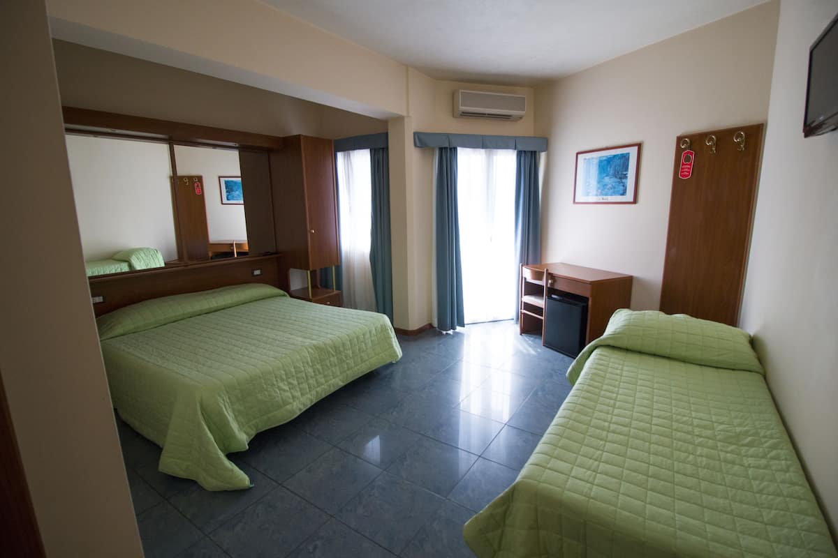 triple room | in-room safe, desk, blackout curtains, soundproofing