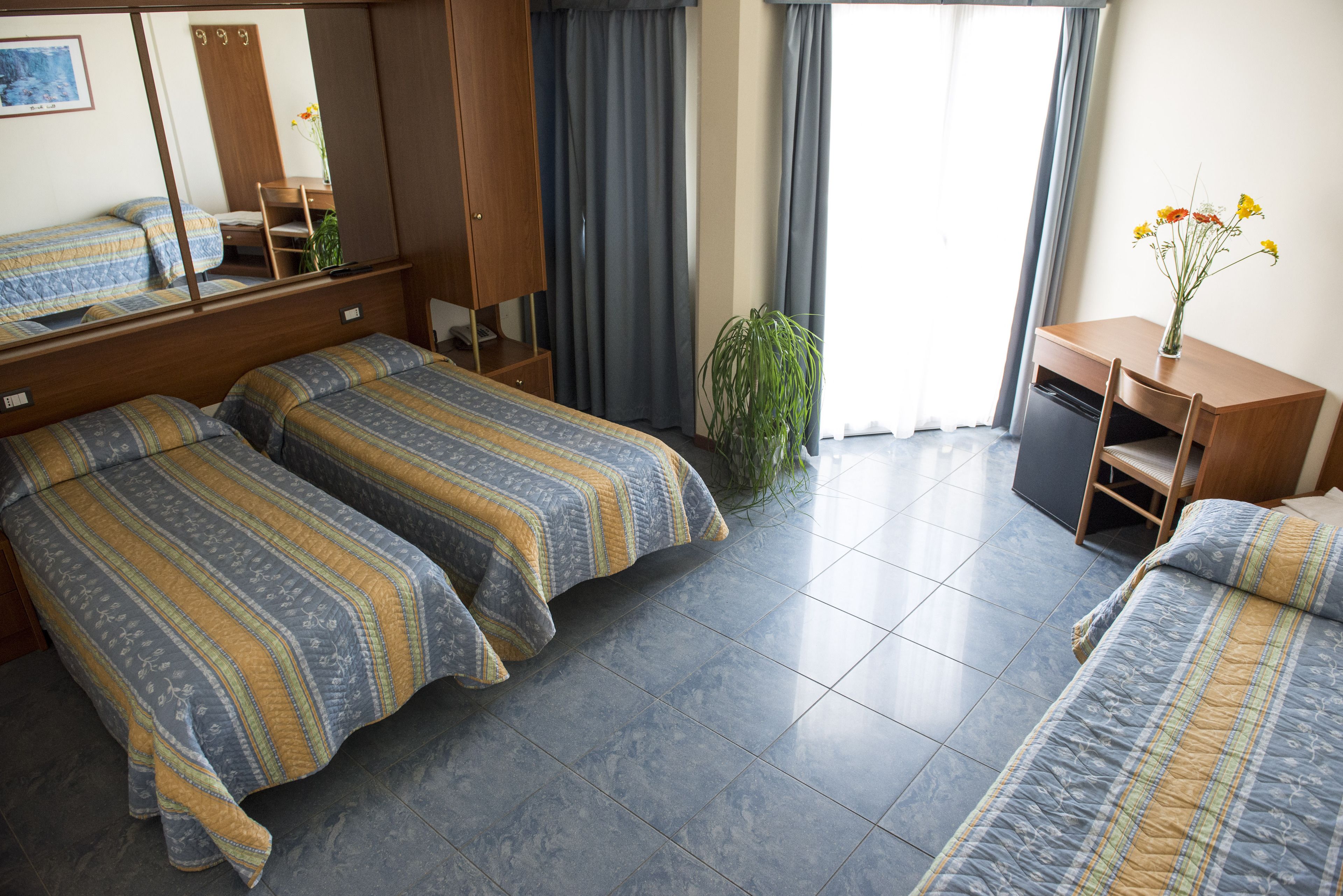 triple room | in-room safe, desk, blackout curtains, soundproofing