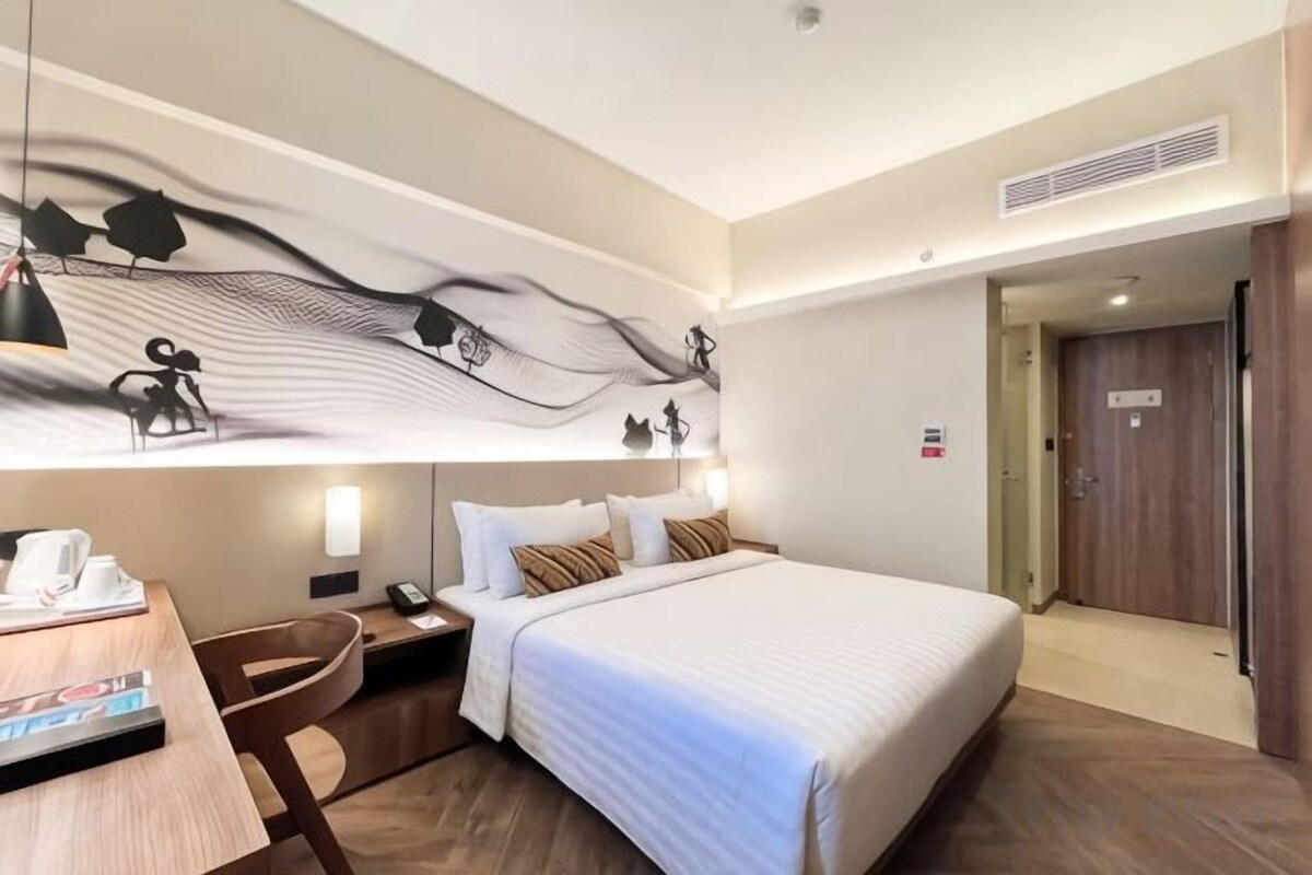 Ropa de cama de alta calidad, minibar, caja fuerte y escritorio