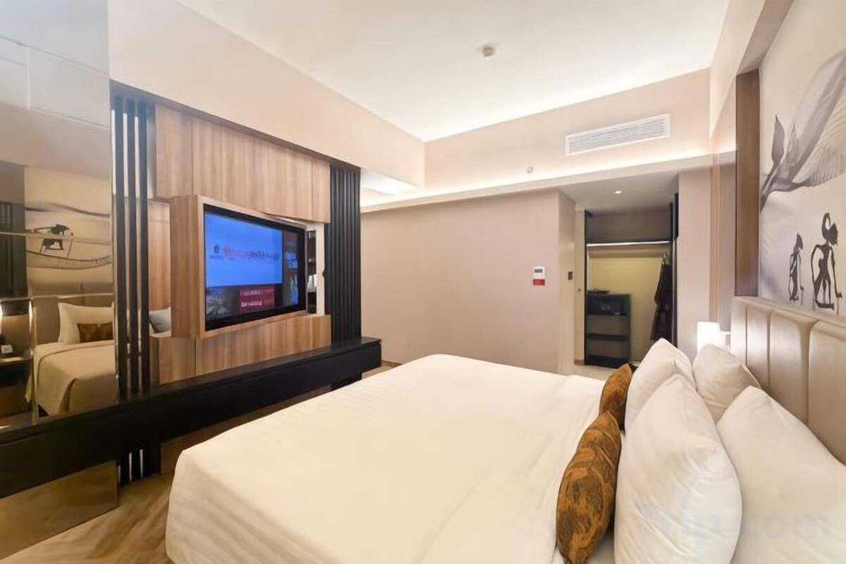 Ropa de cama de alta calidad, minibar, caja fuerte y escritorio