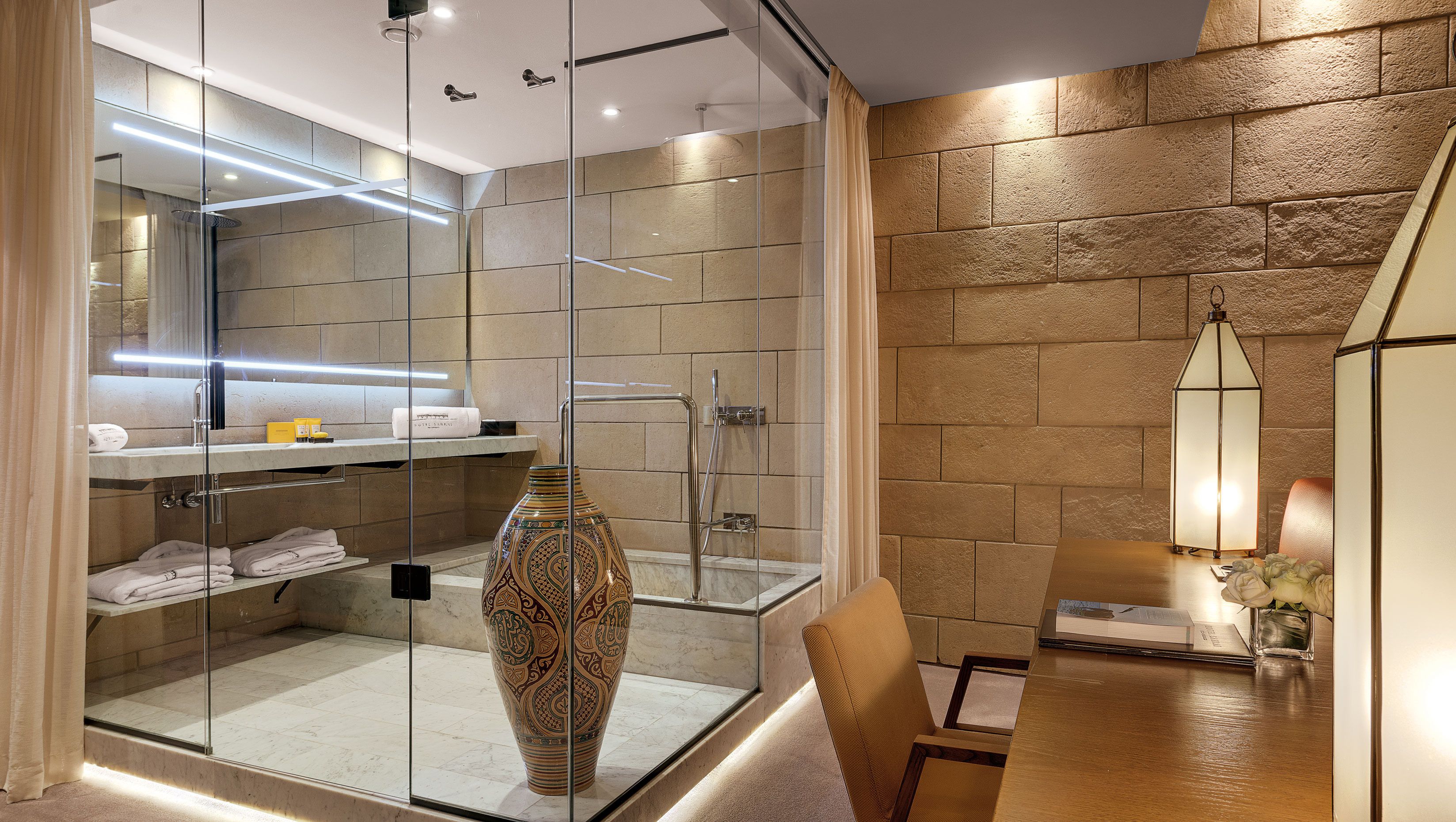 superior suite | bathroom | combined shower/bathtub, deep-soaking bathtub, rainfall showerhead