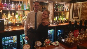 A bar with various liquor bottles and a selection of draft beer taps. - The Bulls Head (Chichester)