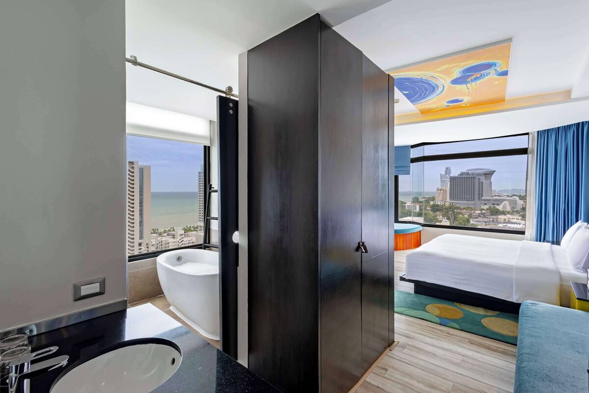 Enjoy a city view from the balcony and unwind in the separate bathroom with a bathtub.