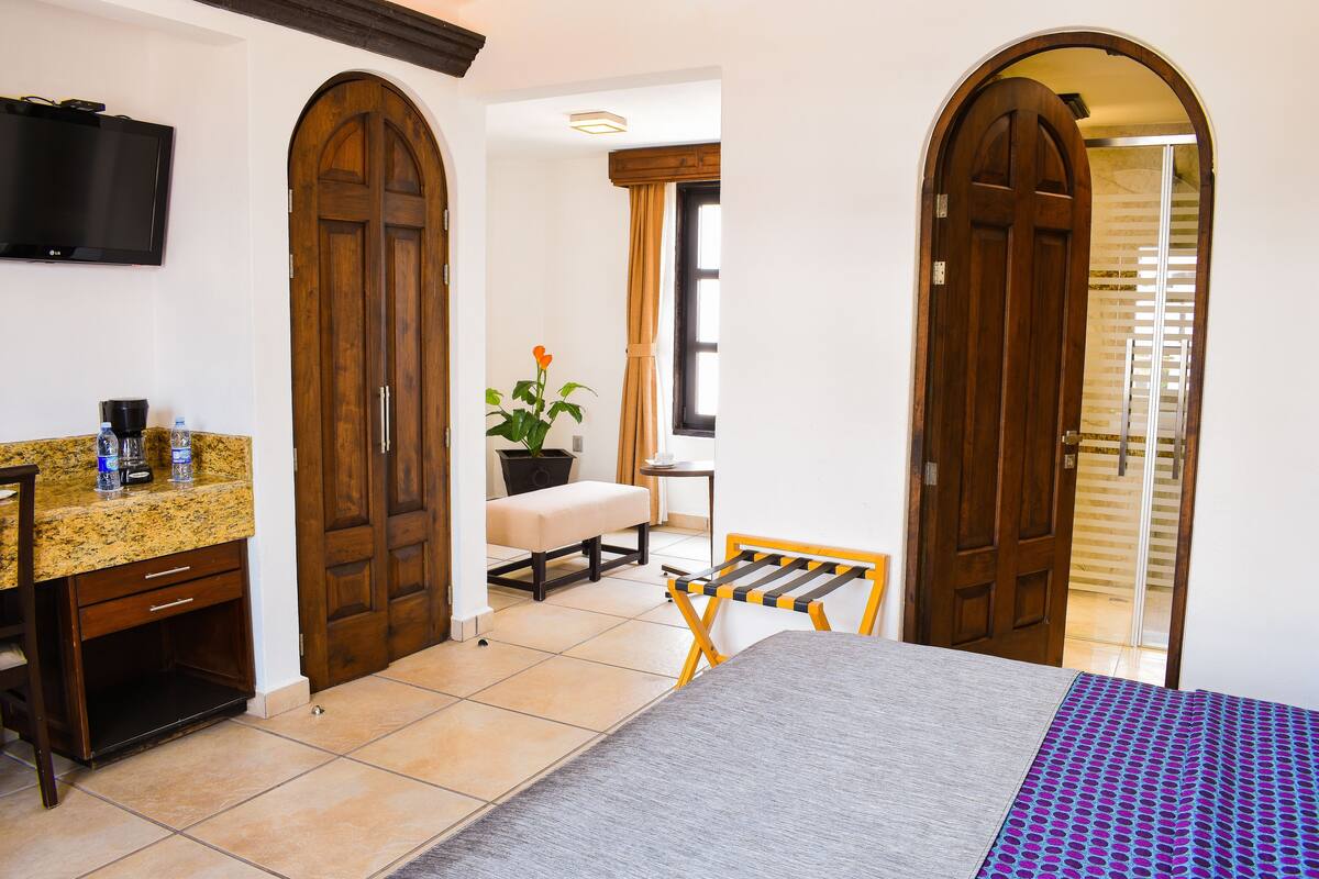 superior room | in-room safe, desk, iron/ironing board, bed sheets