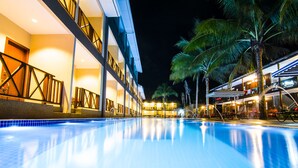 A hotel with a swimming pool, multiple floors, and palm trees. - Summer Bay Resort, Lang Tengah Island (Lang Tengah Island)