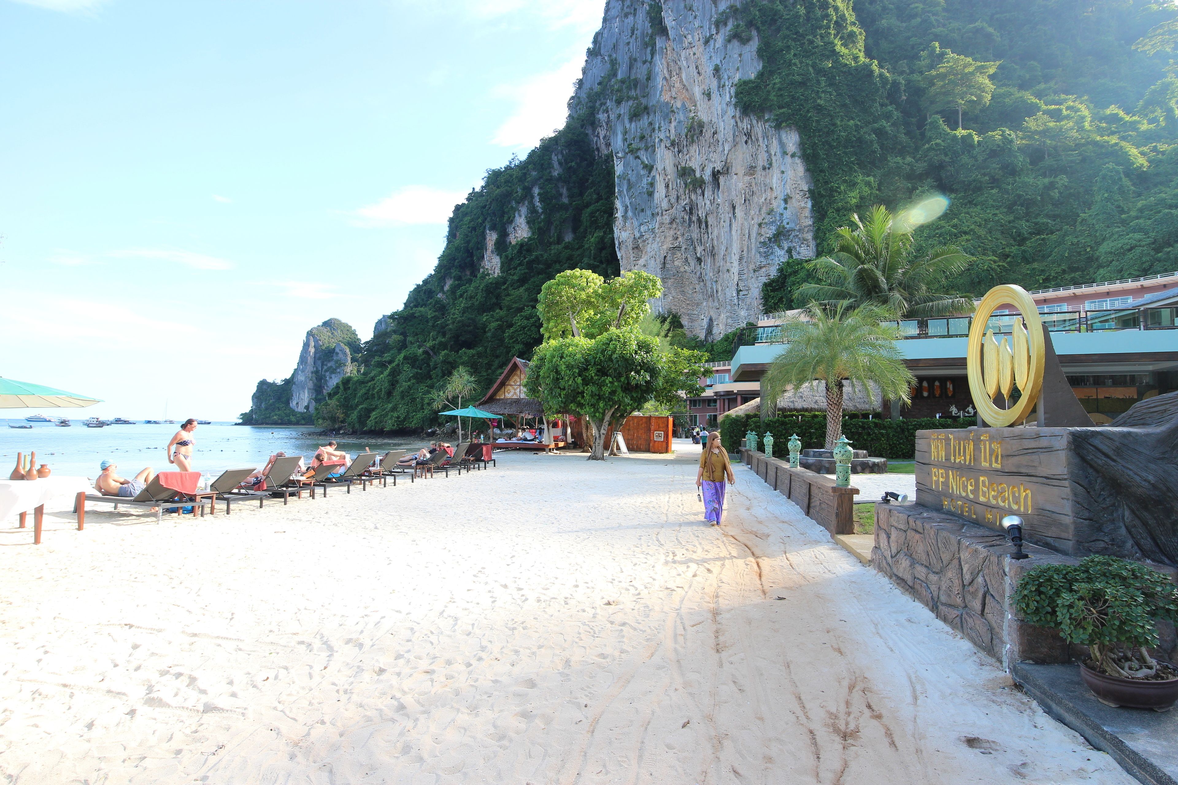 Private beach, white sand, sun loungers, beach umbrellas
