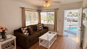 Standard Suite, 1 Bedroom, Non Smoking, Partial Sea View | Living area | LCD TV - Coral Key Inn (Lauderdale-by-the-Sea)