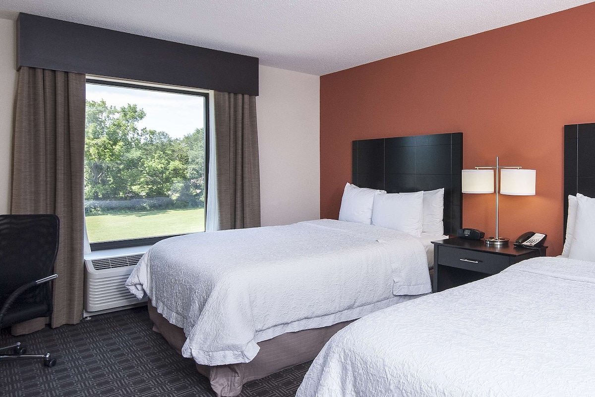 Hypo-allergenic bedding, down comforters, desk, laptop workspace
