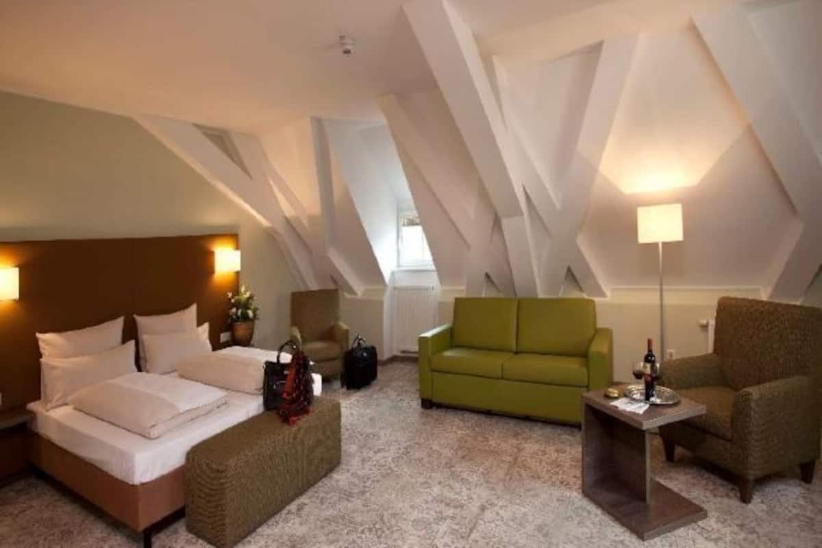 Premium bedding, in-room safe, desk, soundproofing