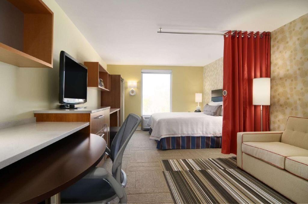 In-room safe, desk, laptop workspace, blackout curtains