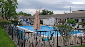 Seasonal outdoor pool, pool umbrellas