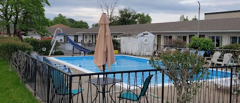 Seasonal outdoor pool, pool umbrellas