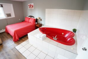 Honeymoon Double Room, 1 Queen Bed, Jetted Tub | Private spa tub - Falcon Inn (Niagara Falls)