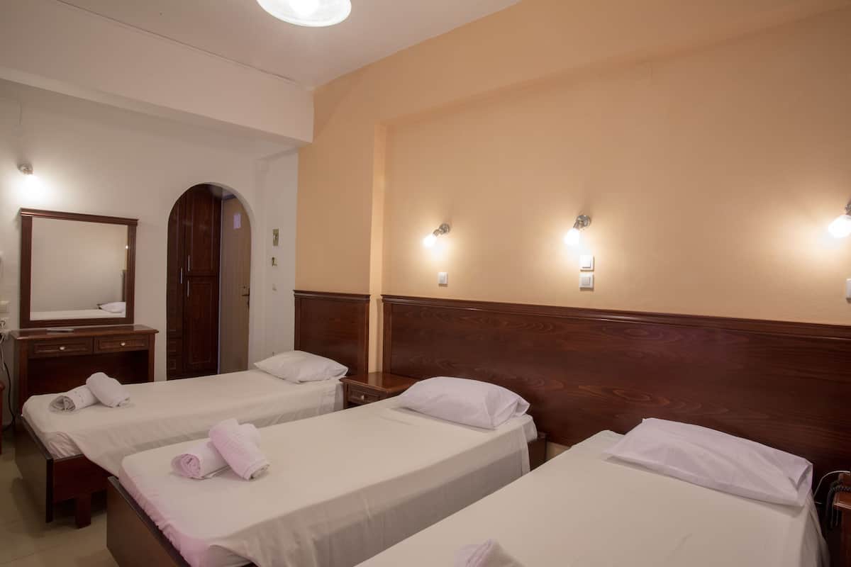 Triple Room | Iron/ironing board (on request), cribs (free), WiFi (free), bed sheets