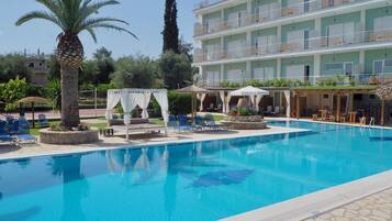 Outdoor pool, pool umbrellas, pool loungers