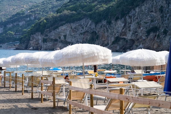 Private beach nearby, sun loungers, beach umbrellas