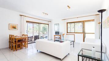 Apartment, 2 Bedrooms | Living area | TV
