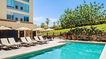 Outdoor pool, open 7:30 AM to 10:00 PM, pool umbrellas, pool loungers