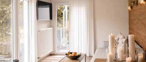 Panoramic Apartment, 1 Queen Bed, Kitchenette, Garden View | Living area | TV