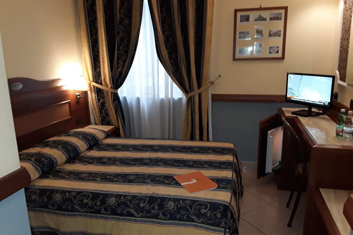 premium bedding, desk, laptop workspace, blackout curtains