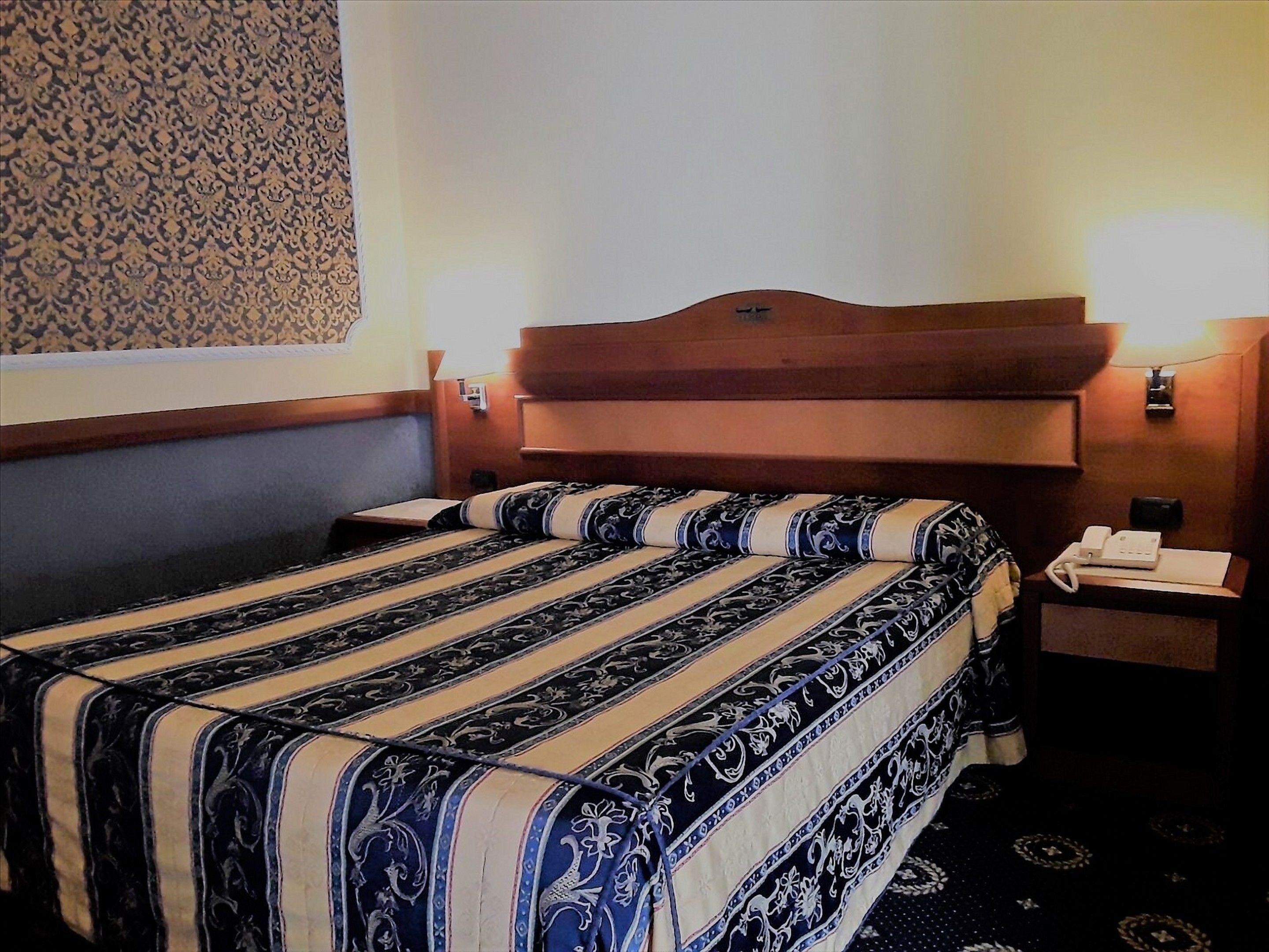 premium bedding, desk, laptop workspace, blackout curtains