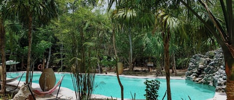 Outdoor pool, open 7:00 AM to 7:30 PM, pool umbrellas