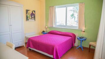 Standard Triple Room | Minibar, in-room safe, desk, blackout curtains