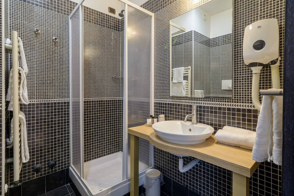 shower, free toiletries, hair dryer, bathrobes