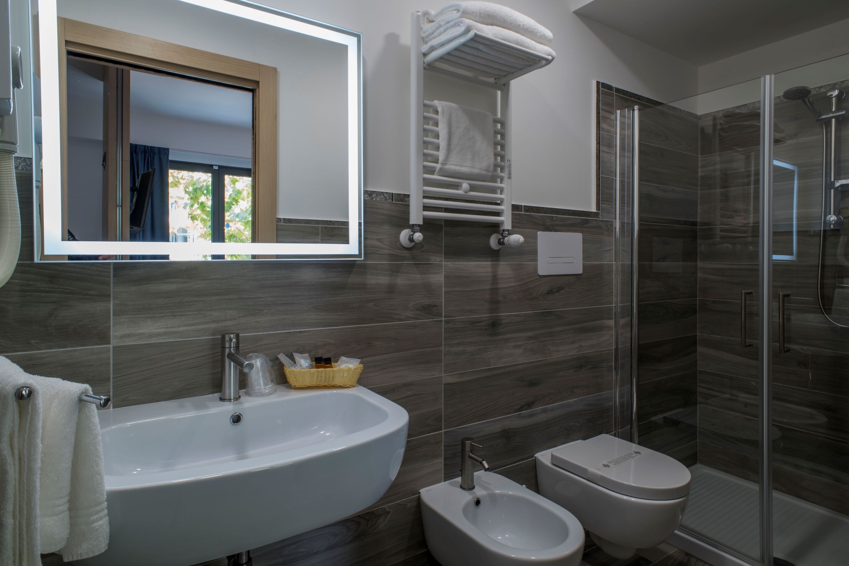 shower, free toiletries, hair dryer, bathrobes