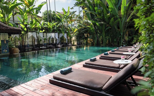 Outdoor pool, open 9:00 AM to 9:00 PM, pool umbrellas, sun loungers