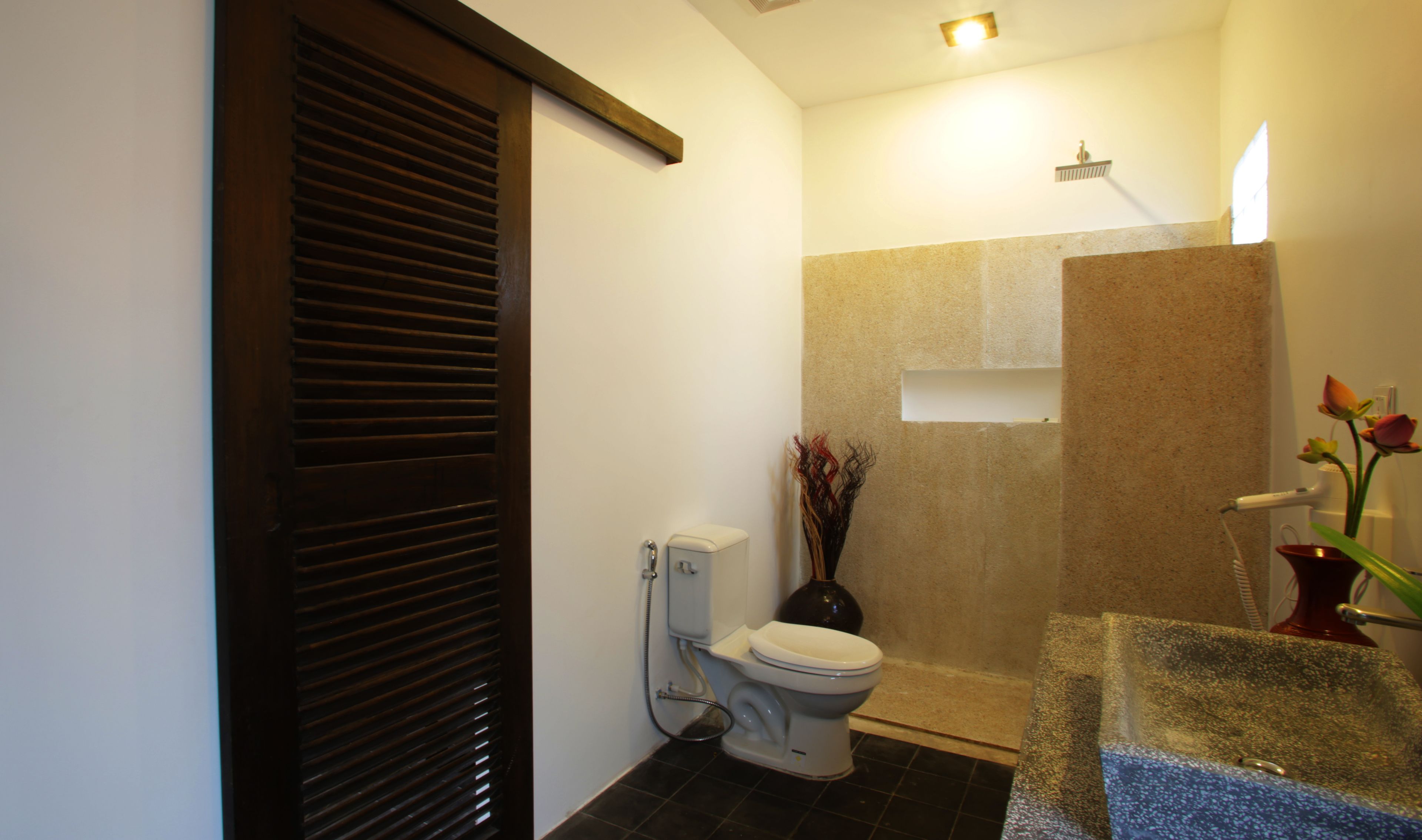 separate bathtub and shower, rainfall showerhead, designer toiletries