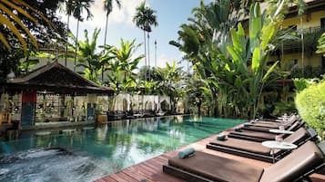 Outdoor pool, open 9:00 AM to 9:00 PM, free cabanas, pool umbrellas