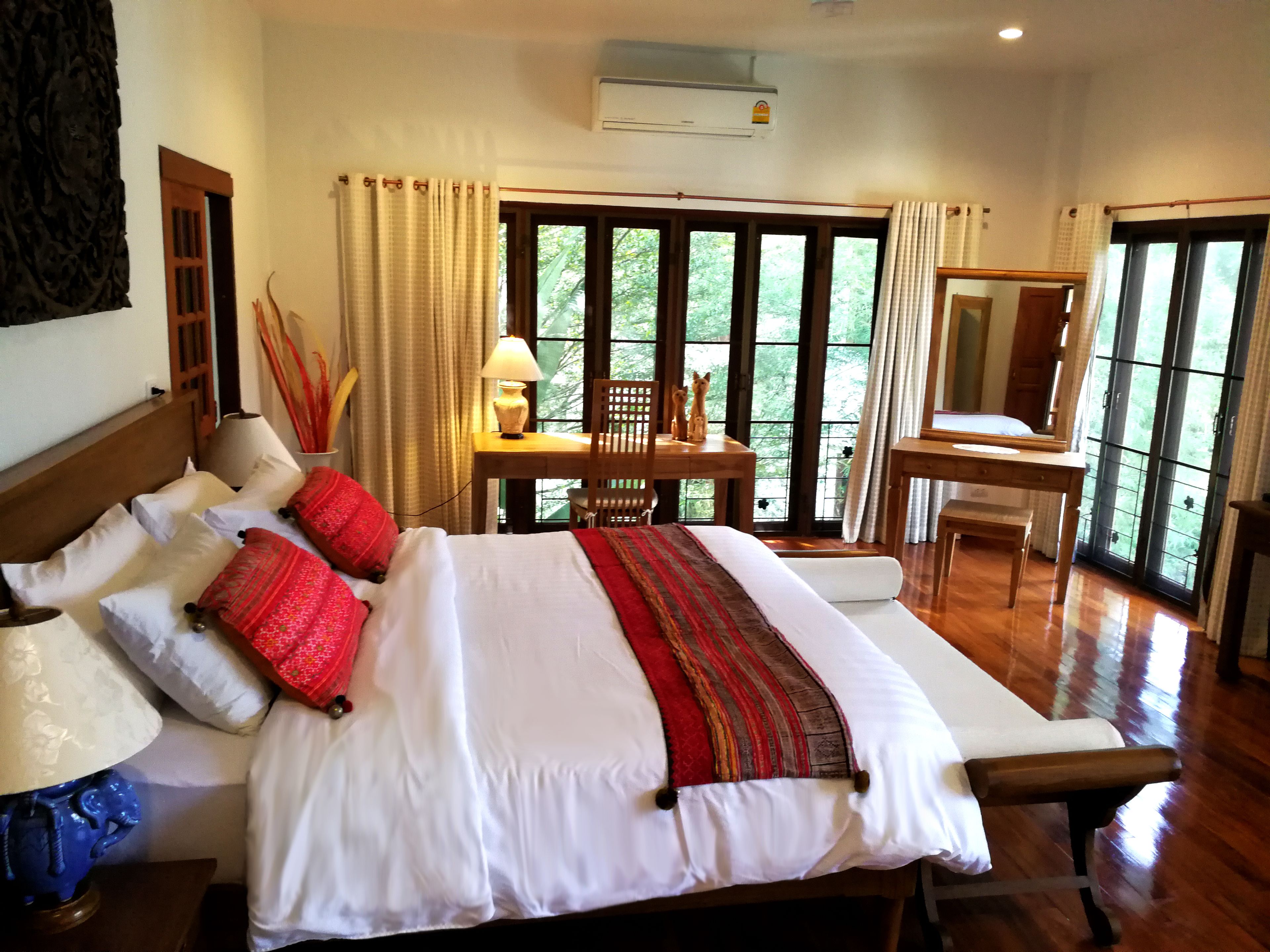 Luxury Suite, 1 King Bed, Garden View, Garden Area | Minibar, in-room safe, individually decorated, individually furnished