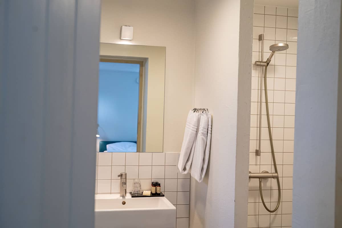 junior suite | bathroom | hair dryer, towels, soap, shampoo