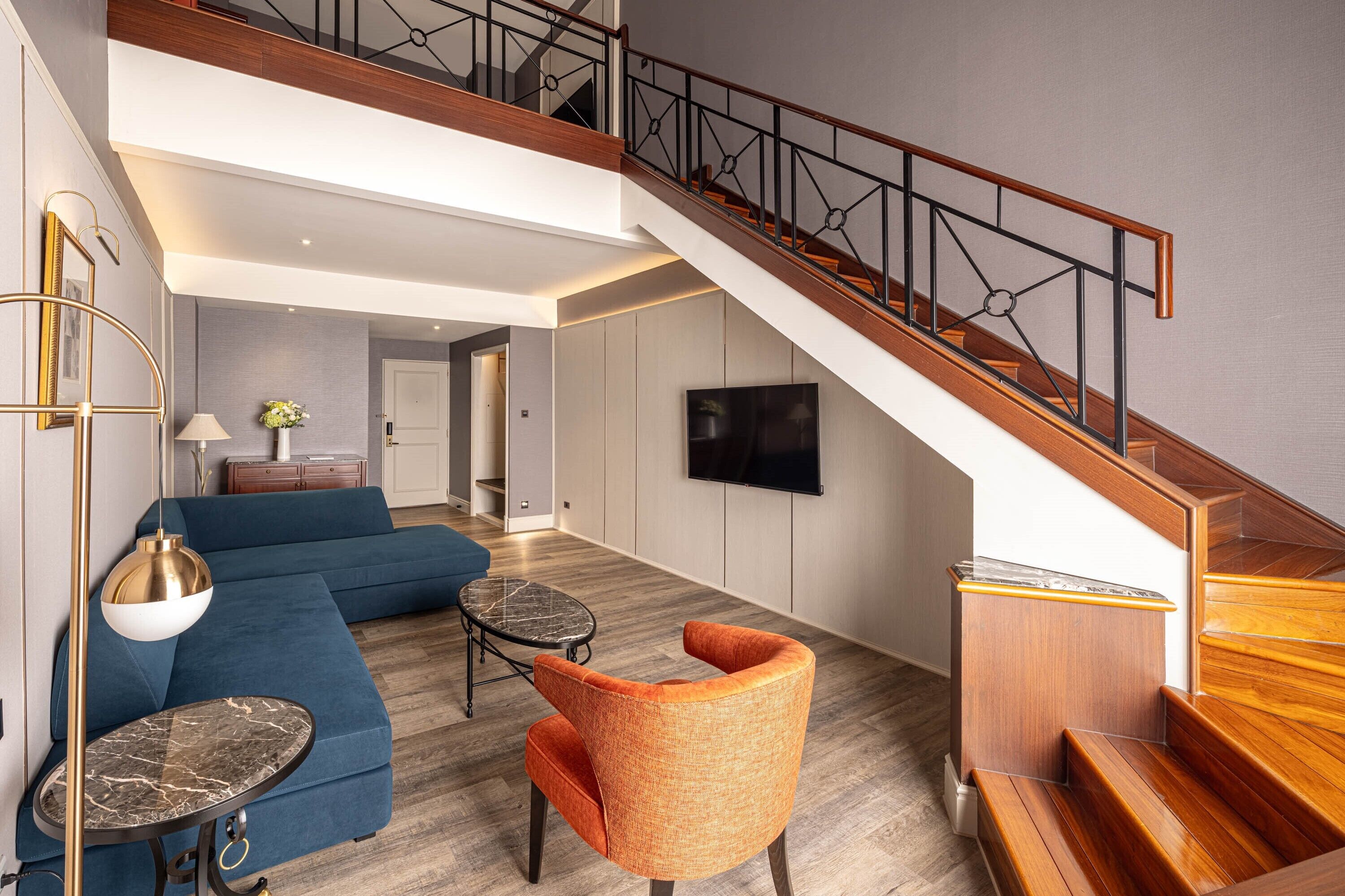 premier duplex king room | living area | 55-inch lcd tv with cable channels, tv