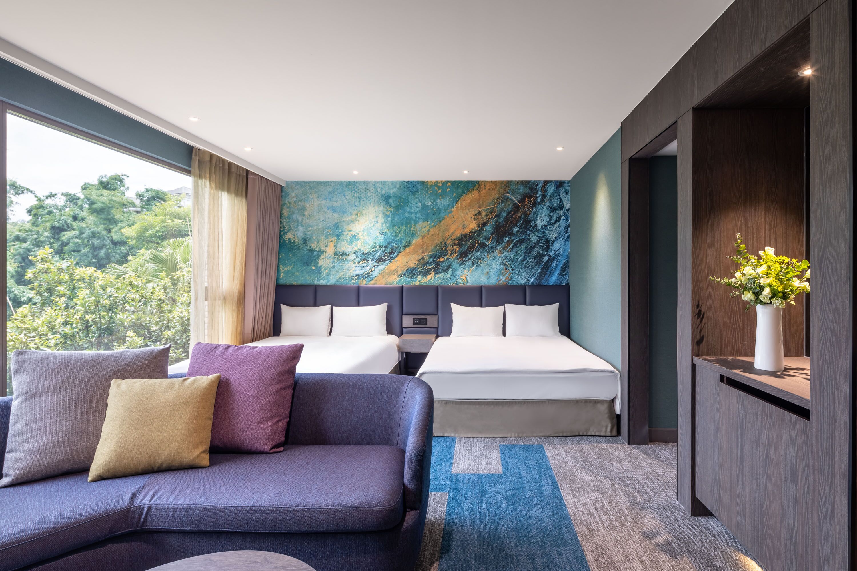 premier family room | down duvets, minibar, blackout curtains, iron/ironing board