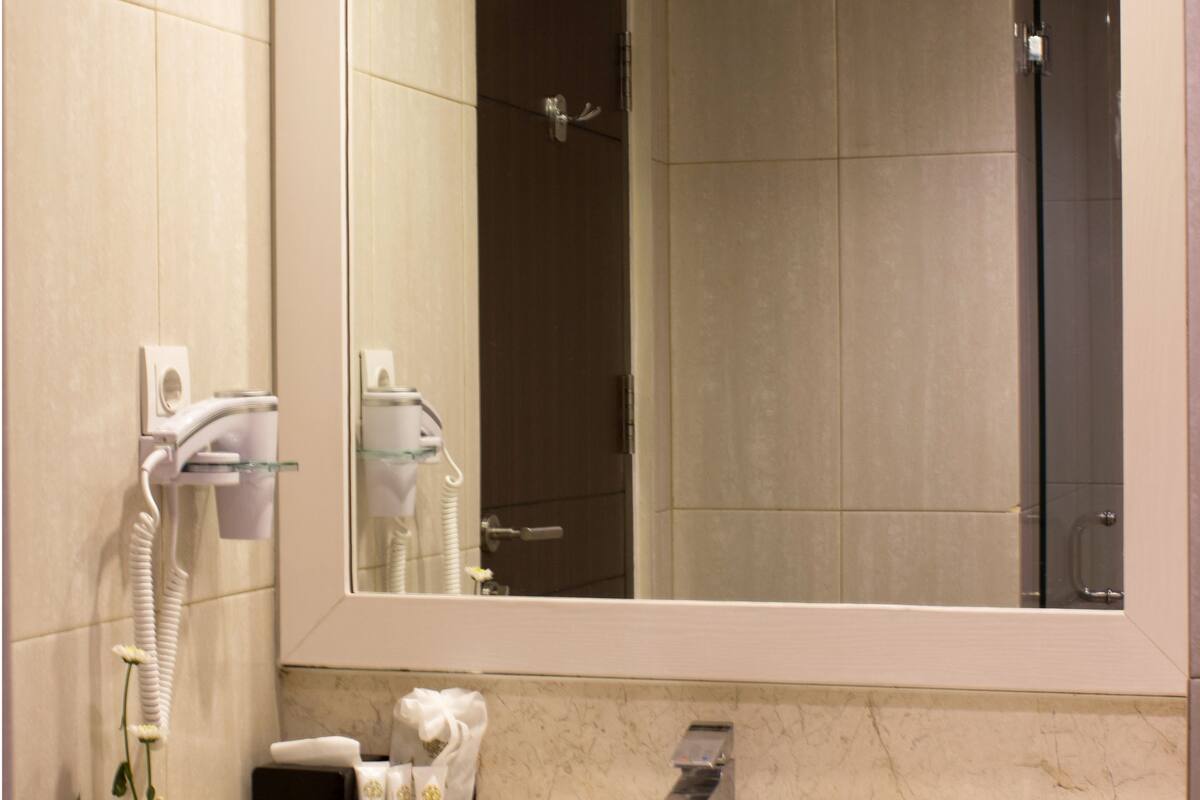 shower, free toiletries, hair dryer, slippers