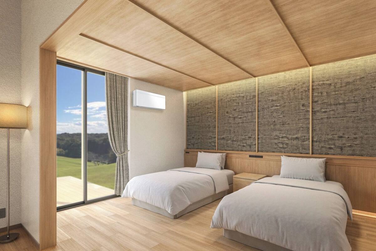 Camera con 2 letti singoli | Una cassaforte in camera, una scrivania, tende oscuranti, Wi-Fi gratuito