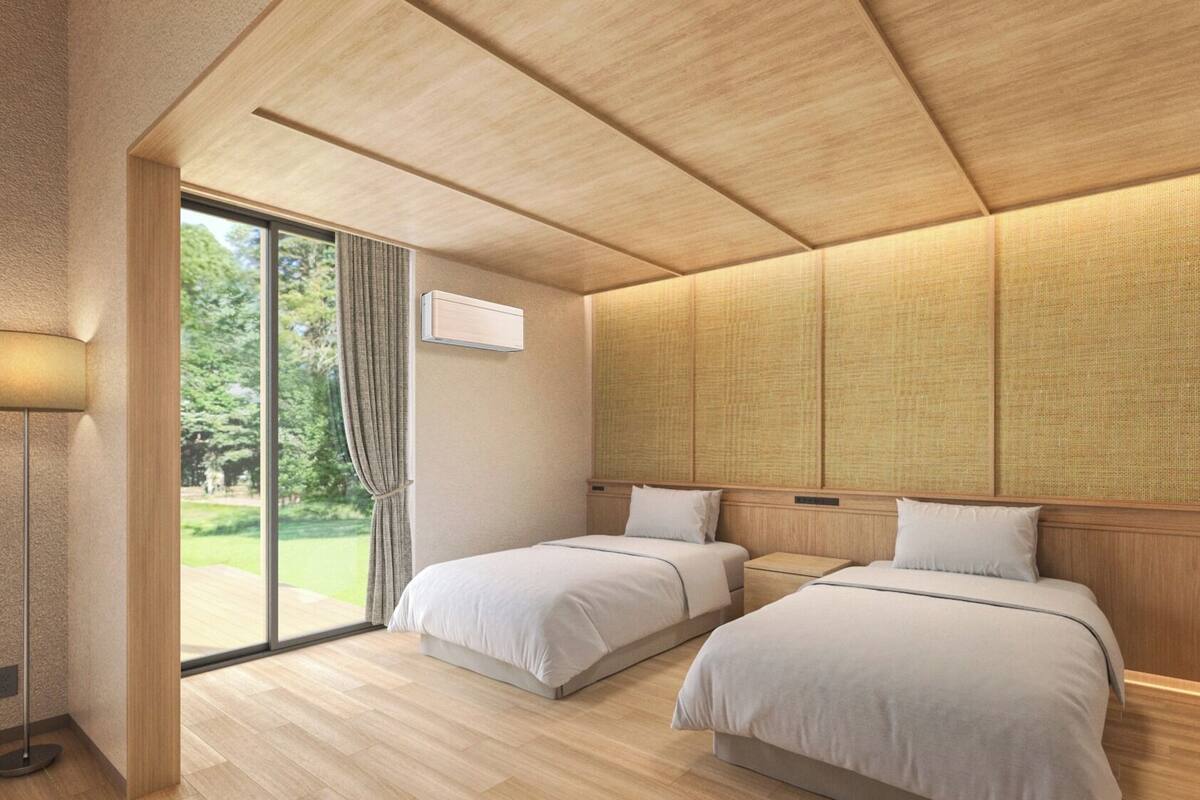 Camera con 2 letti singoli | Una cassaforte in camera, una scrivania, tende oscuranti, Wi-Fi gratuito