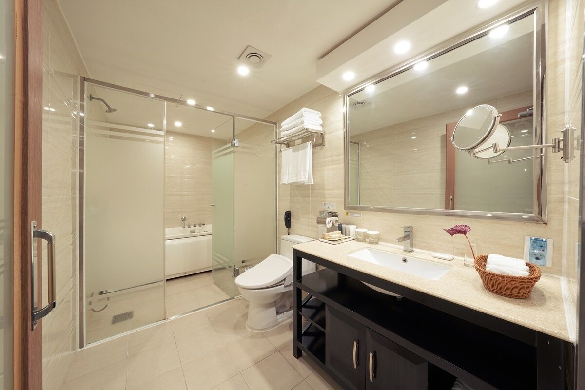deluxe twin room | bathroom | hair dryer, bathrobes, slippers, bidet